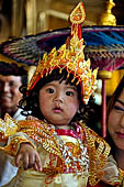 Ear piercing ceremony at Mahamuni Buddha Temple, Myanmar 